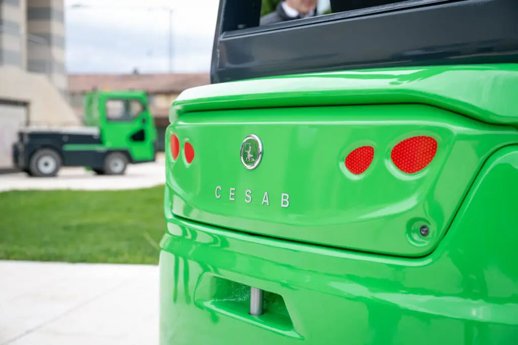 Close-up of the rear of a green CESAB B3 forklift with logo and red taillights. - Prince Maasdijk