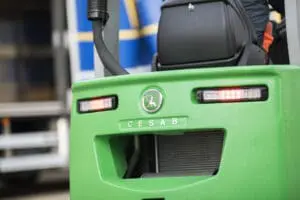 Close-up of the rear of a green CESAB forklift with logo and LED taillights. - Prince Maasdijk