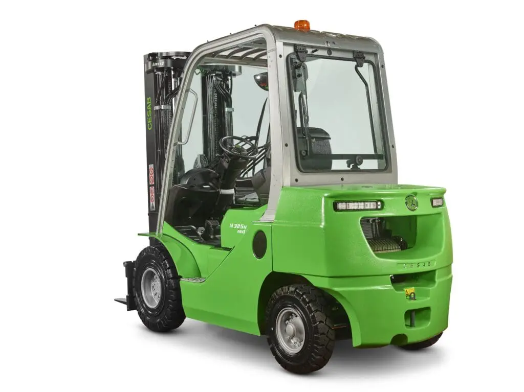 Green CESAB M325H closed-cab forklift, photographed from left-rear corner on white background. - Prince Maasdijk