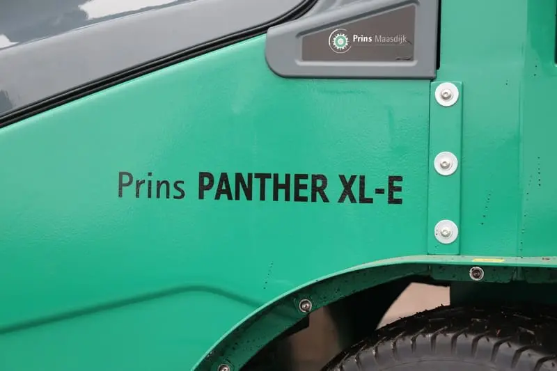 Close-up of the "Prince Panther XL-E" imprint on the green hull with the Prince Maasdijk logo above it. - Prince Maasdijk