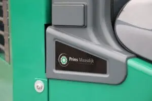 Close-up of the Prins Maasdijk logo on the green side of the Prins Panther XL-E forklift. - Prince Maasdijk