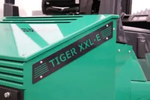 Close-up of the "Tiger XXL-E" nameplate on the green body of the Prince Tiger XXL-E forklift. - Prince Maasdijk